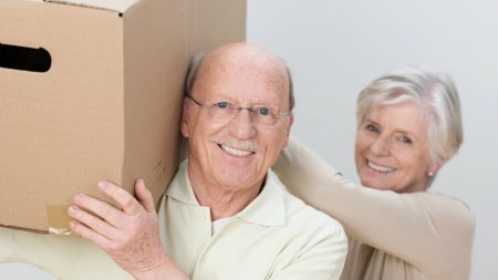 Older couple moving boxes